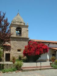 (CC) Photo: Stephen LeaMission Carmel's campanile ("bell tower") as seen from the central courtyard in June 2004.