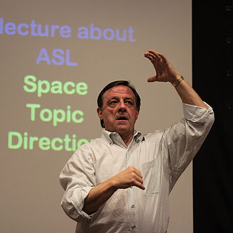 This lecture on American Sign Language is being conducted in ASL. Today, much research on sign language comes from linguists who are themselves deaf.